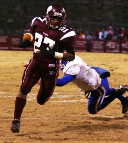 Tennessee High running back Jonathan Howard [27] scores on this 35-yard pass from Danny Thomas in first-round win over Volunteer.